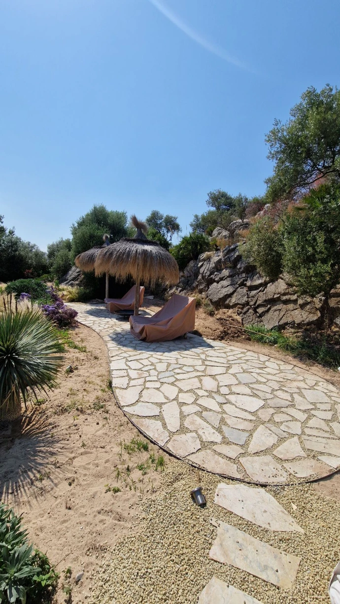 Custom-built terrace integrated into the surrounding landscape of this Bonaire villa.